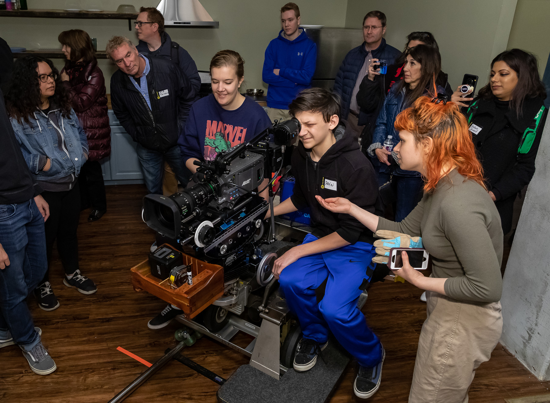 Attendees try out film equipment during the Chicago Ideas Week Lab: Behind the Scenes at Cinespace with DePaul University, Monday, Oct. 14, 2019, at Cinespace Chicago Film Studios on Chicago’s West Side. (DePaul University/Jeff Carrion)